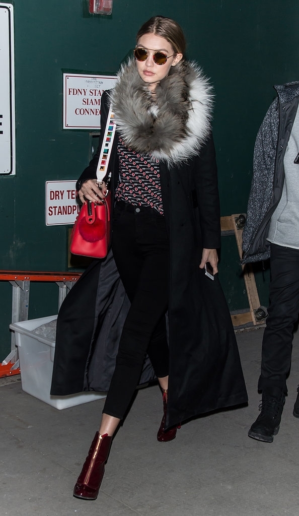 Gigi Hadid wearing a Fendi bag and KREWE du optic sunglasses.  