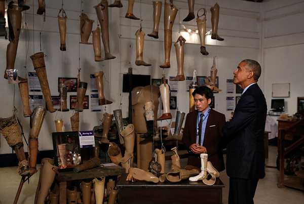 Obama visited victims of amputations due to accidents caused by unexploded bombs dropped by the US during Vietnam War