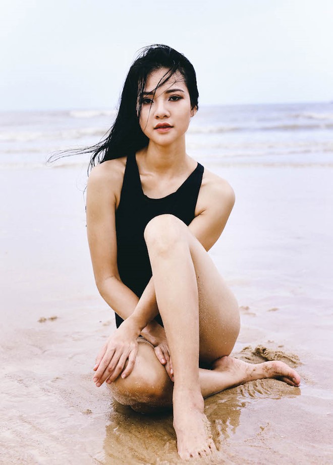 Hoa hau the thao Tran Thi Quynh goi cam voi bikini hinh anh 2