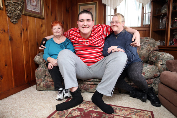 Broc towers over his family, who do not suffer from the condition