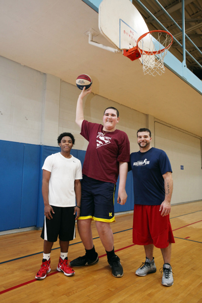 However, his height proves an advantage when he plays basketball with friends