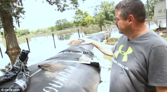 'I was the crazy guy. Everybody was kinda going by, laughing at me. But today they are really impressed with this Aqua Dam,' Wagner told KENS5 (pictured, his house after the flood) 