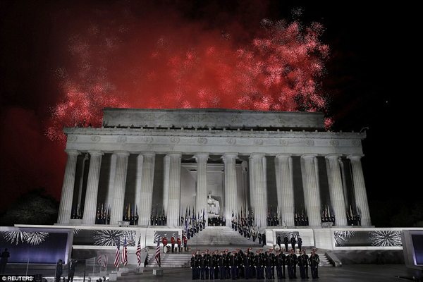 Fireworks exploded over the Lincoln Memorial after the commander-in-chief-to-bes speech, who had his family by his side