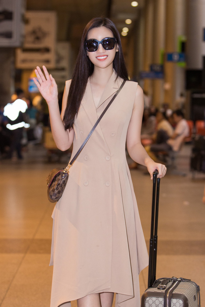 Hoa hậu Mỹ Linh tươi như hoa trở về Việt Nam sau Miss World - Ảnh 4.