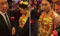 Xôn xao cô dâu 20 tuổi được tặng 20kg vàng đeo trĩu cổ trong ngày cưới