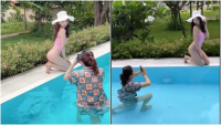 Ngắm loạt ảnh Ngọc Trinh cực gợi cảm với bikini, dân tình bất ngờ khi biết danh tính người chụp ảnh